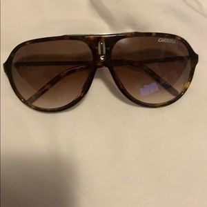 Gently used tortoise shell Carrera sunglasses!